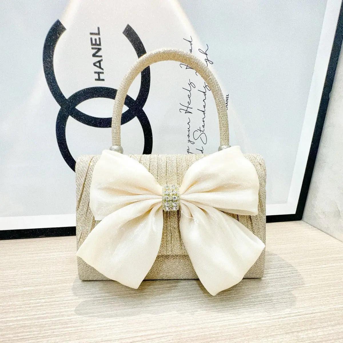 MAC060 Sac à bandoulière portable blanc à nœud papillon, grand design nœud, sac à porter sous le bras