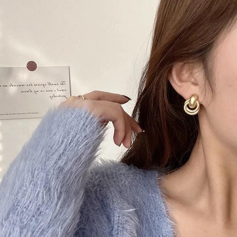 Boucles d'oreilles cercles entrelacés MAC064