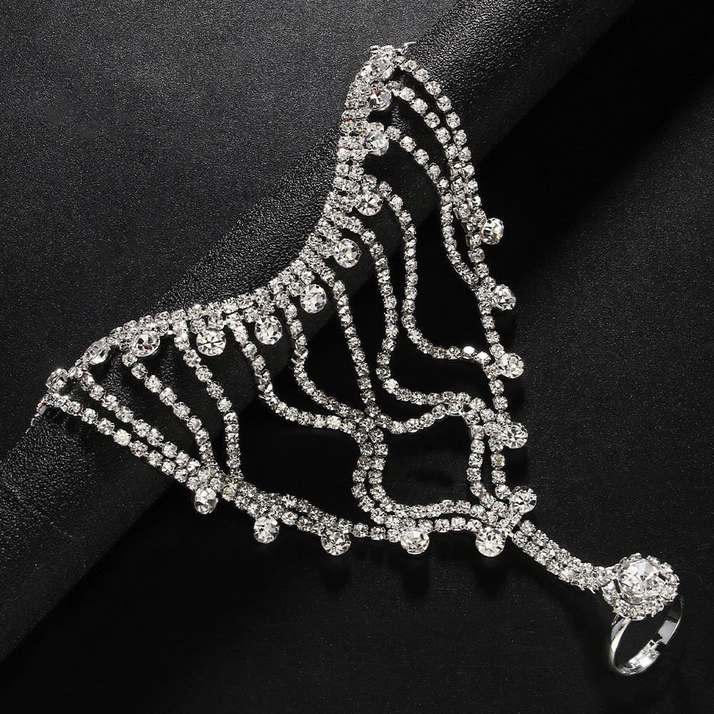 MAC118 Bracelet-bague à pompon Full Diamond, luxe discret