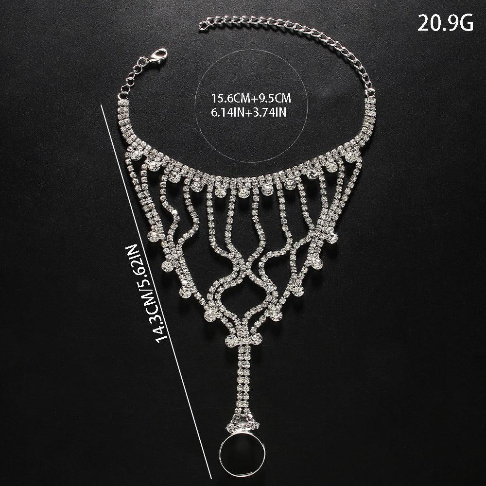 MAC118 Bracelet-bague à pompon Full Diamond, luxe discret