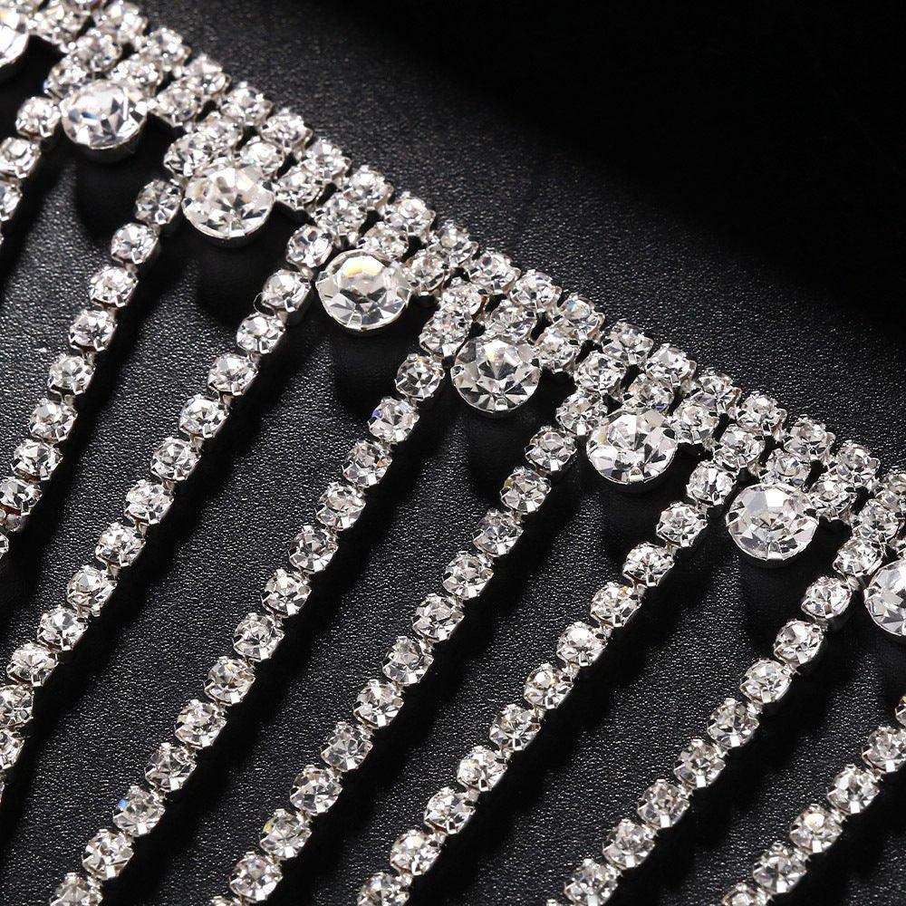 MAC118 Bracelet-bague à pompon Full Diamond, luxe discret